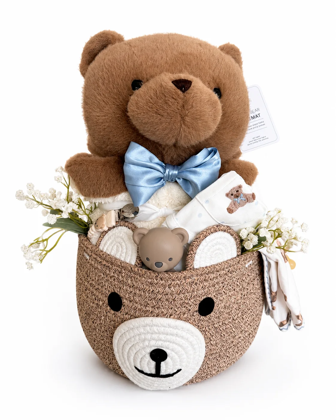Baby gift basket with teddy bear, blue bow, florals, and keepsake baby items
